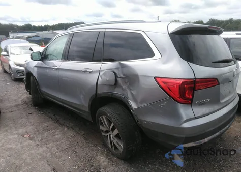 2017 Honda Pilot Touring z USA, uszkodzony, nr VIN 5FNYF5H96HB043319